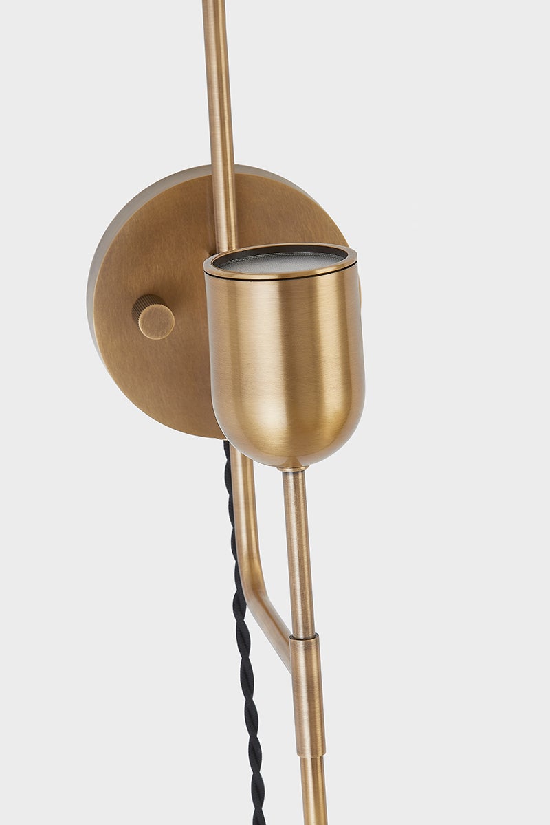 Manti Plug-In Sconce by Troy Lighting, Dimmable, Patina Brass Finish, Soft Sand Glass Shade