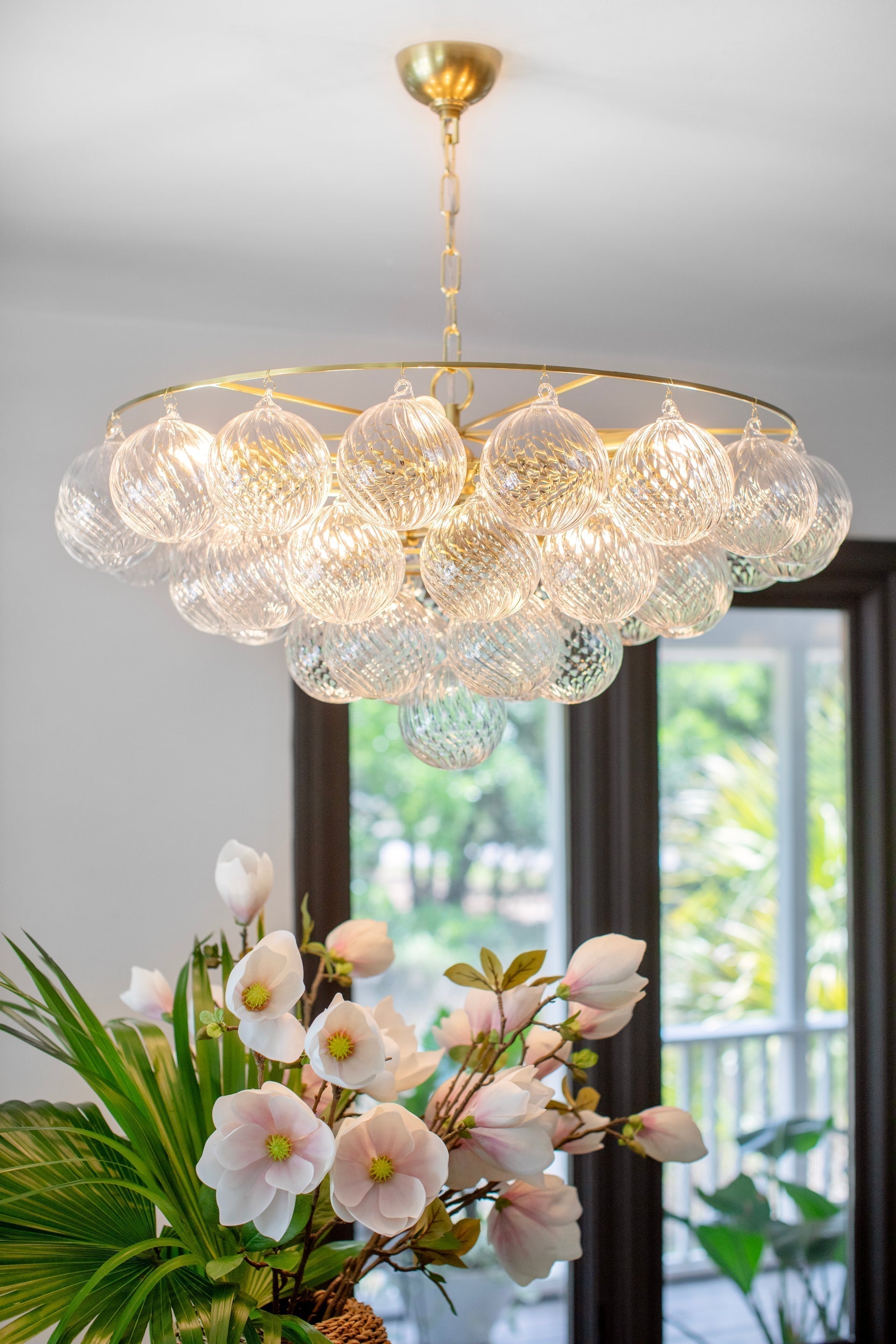 Mimi 9-Light Chandelier by Mitzi with Aged Brass Frame & Swirl Ribbed Glass Globes