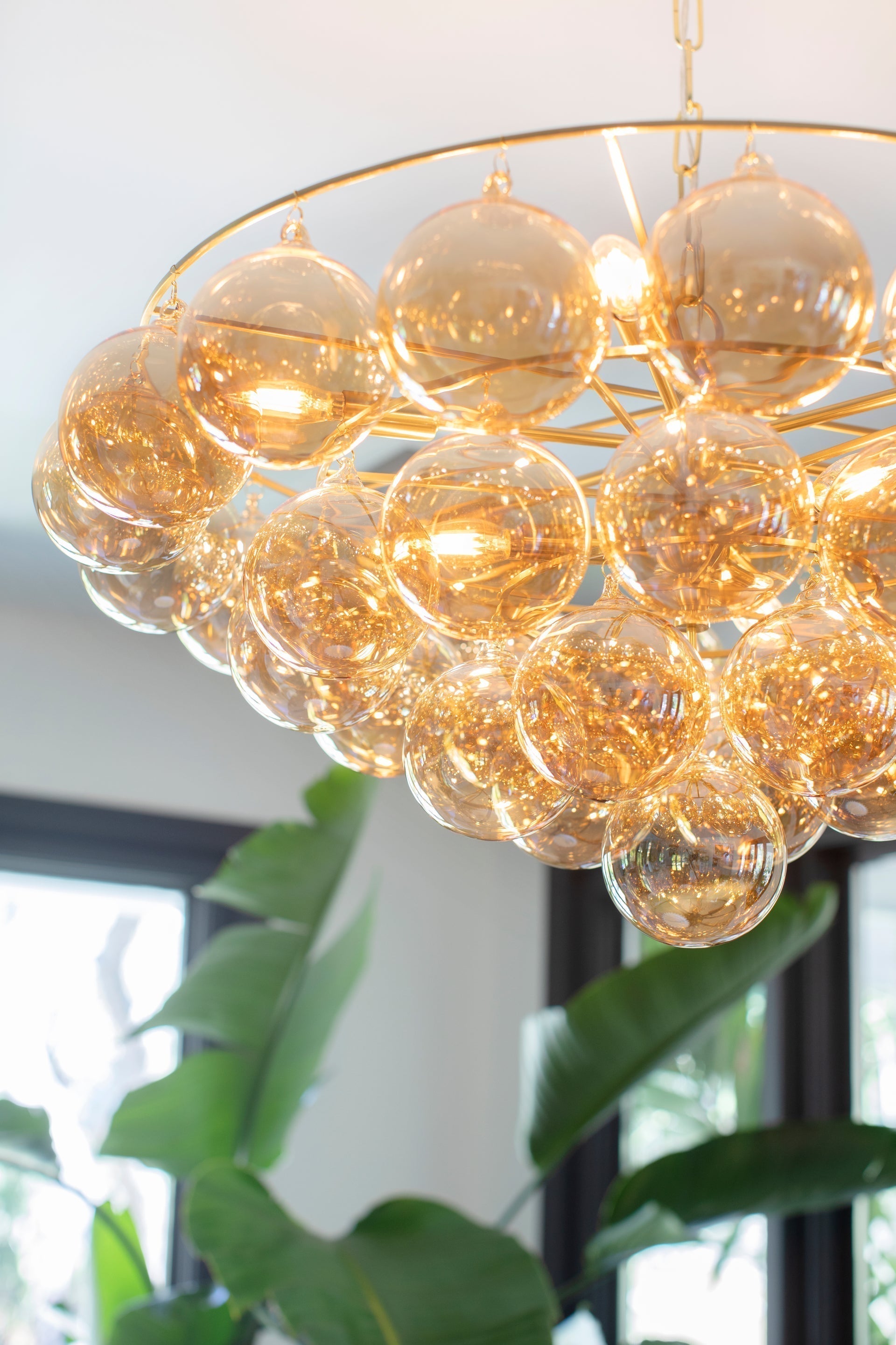 Mimi 9-Light Chandelier by Mitzi with Aged Brass Frame & Swirl Ribbed Glass Globes