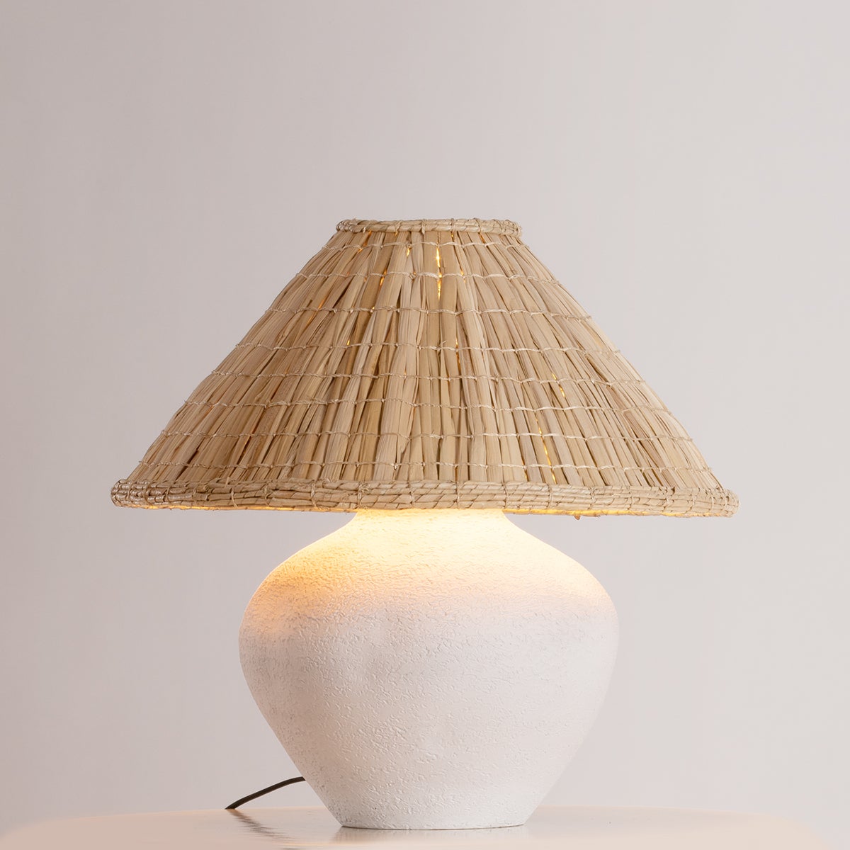 Solon Table Lamp by Troy Lighting with Dimmable Feature and Unique Ceramic Base in Patina Brass Finish