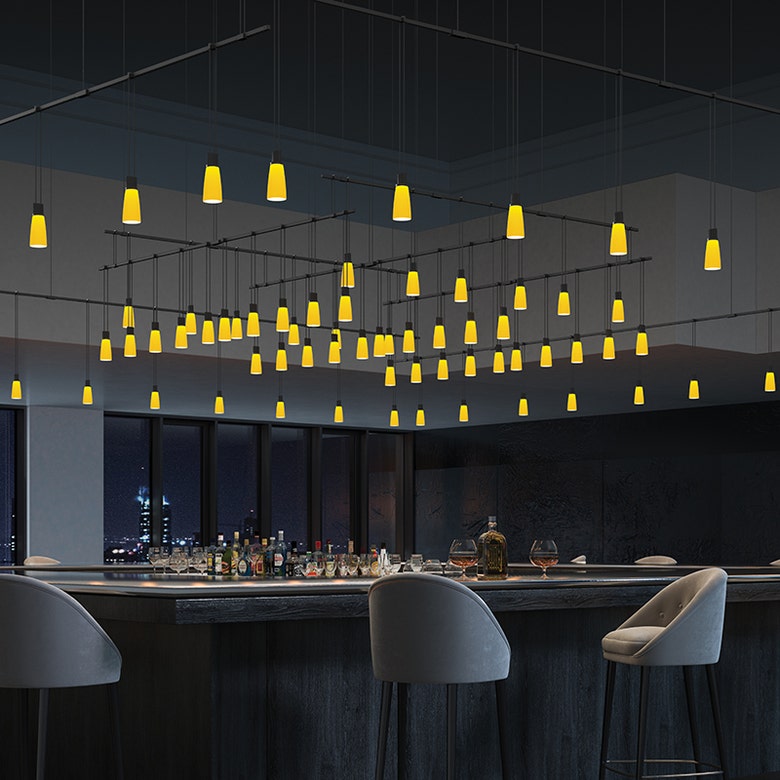 Suspenders Expanded Grid with Amber Tapered Bell Luminaires