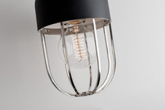 Mitzi Haley Sconce – Elegant Metal Cage Design with Dark Domed Shade in Aged Brass or Polished Nickel