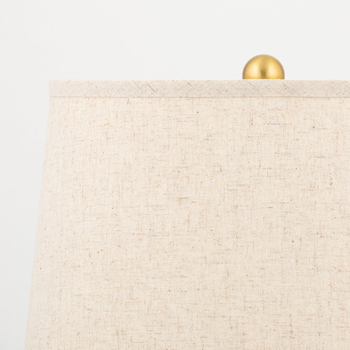 Mitzi-Roshani Table Lamp - Unique Matte White Ceramic Shape With Natural Linen Shade And Aged Brass Accents