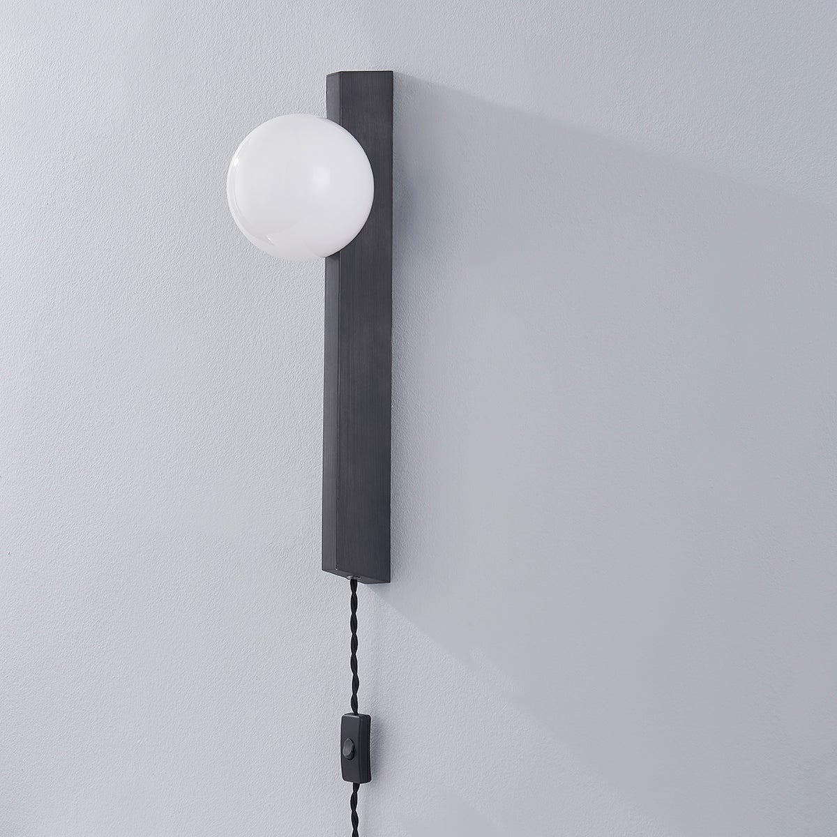 Troy Lighting-Brisbane Plug-In Sconce with Opal Glass Globe and Black Twisted Cord, Graphite Finish