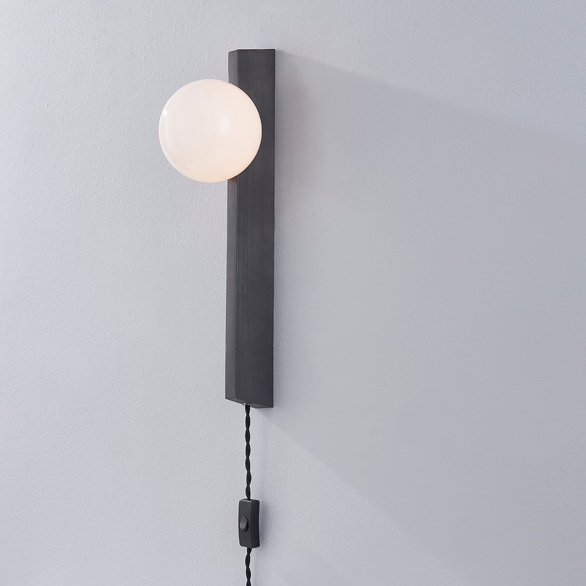 Troy Lighting-Brisbane Plug-In Sconce with Opal Glass Globe and Black Twisted Cord, Graphite Finish