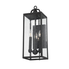 Troy Lighting Caiden Medium Outdoor Wall Sconce With Forged Iron Frame And Clear Seeded Glass