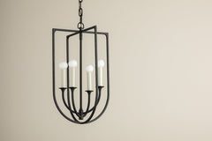 Troy Lighting Kael Minimalist Lantern with Open Cage Structure and Classic Black Iron Finish